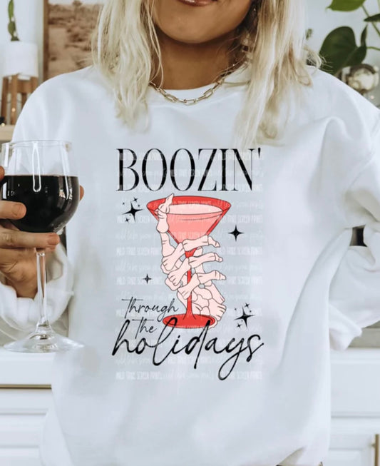 Boozin’ through the holidays sweatshirt